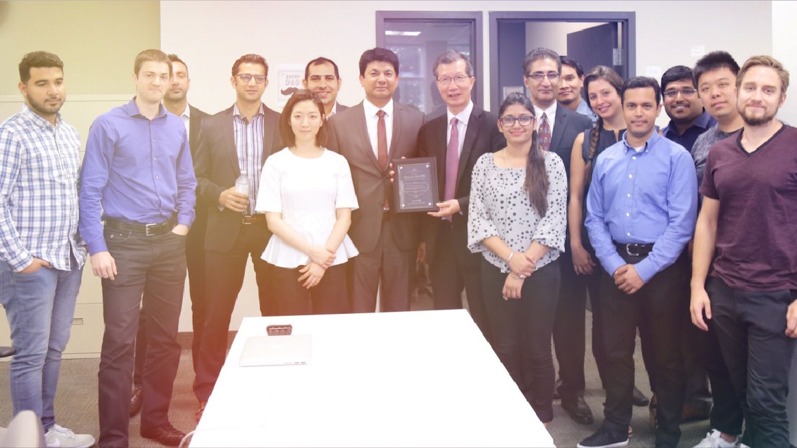 Minister Michael Chan at mobileLIVE office
